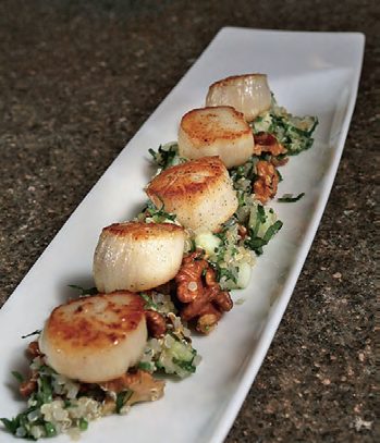 Quinoa salad with apple, toasted walnuts and scallops